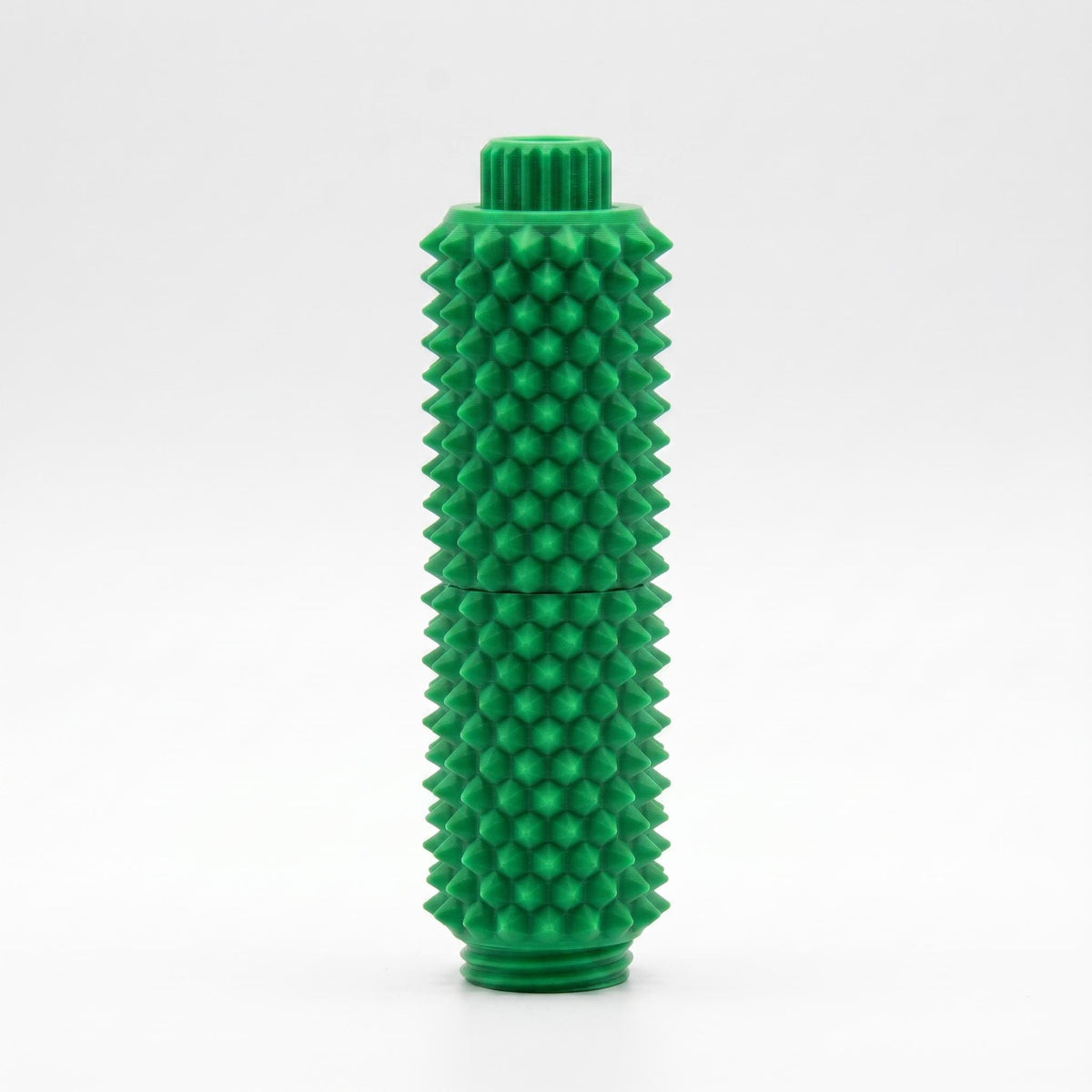 Grünes Spiky Clicker Fidget Toy aus 3D-gedrucktem PLA mit geriffeltem Drehknopf und gleichmäßigen taktilen Stacheln.
