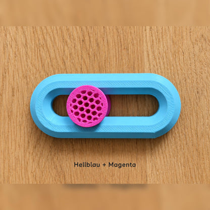 Hellblauer Fidget Slider mit magentafarbenem Knubbel.