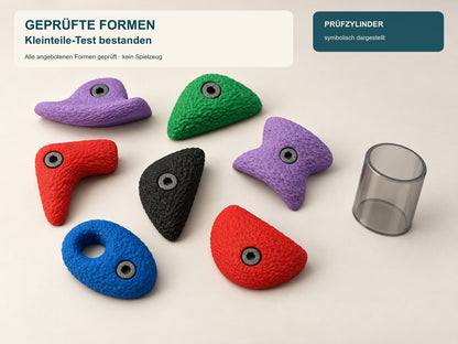 Sieben Bouldergriff-Magnete neben der symbolischen Darstellung eines Prüfzylinders; alle angebotenen XXL-Formen wurden geprüft und haben den Kleinteile-Test bestanden.